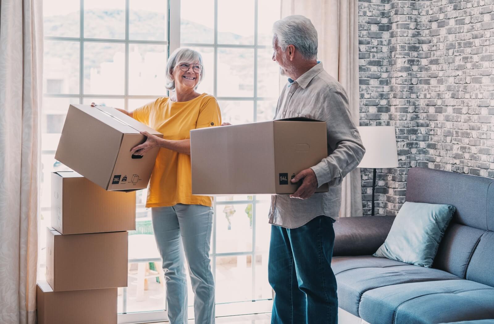 senior couple downsizing to senior living community